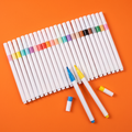 Set of 24 acrylic paint markers with white barrels and colored caps